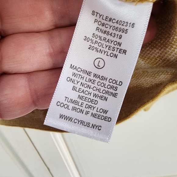 NWT.This is a gold and white floral pullover sweater by the brand Cyrus. - Picture 6 of 7